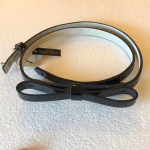White House black market patent leather bow belt S